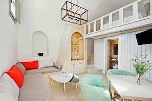 Honeymoon Villa, Jetted Tub | Living area - The Dream (Santorini)