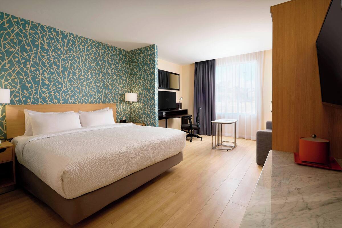 studio, 1 king bed with sofa bed, non smoking | in-room safe, desk, iron/ironing board, free wifi