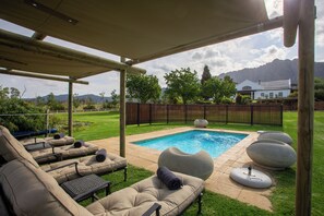 Outdoor pool, pool umbrellas, pool loungers