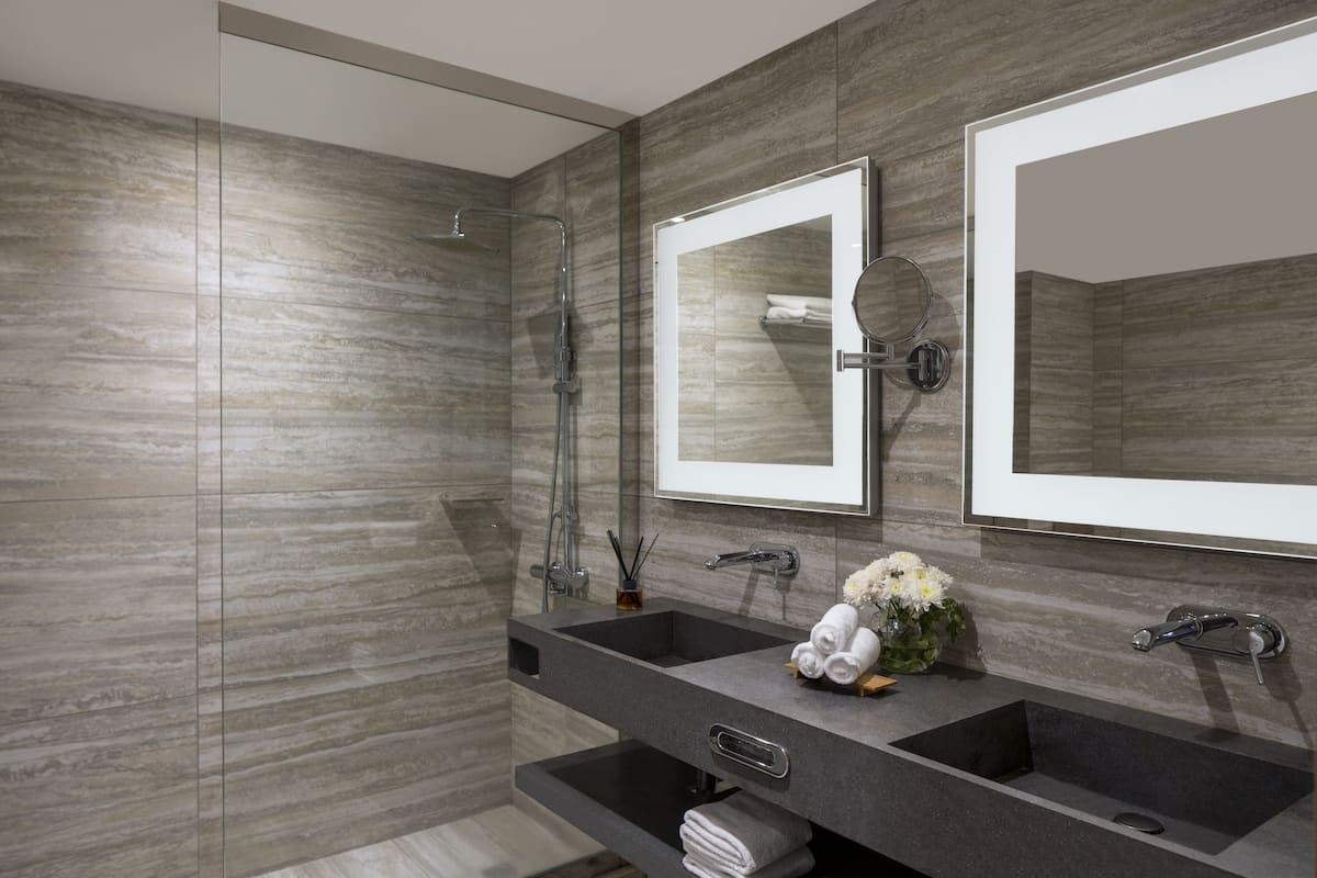 shower, eco-friendly toiletries, hair dryer, towels