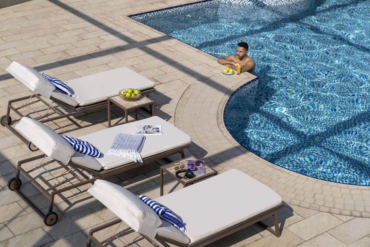outdoor pool, pool loungers