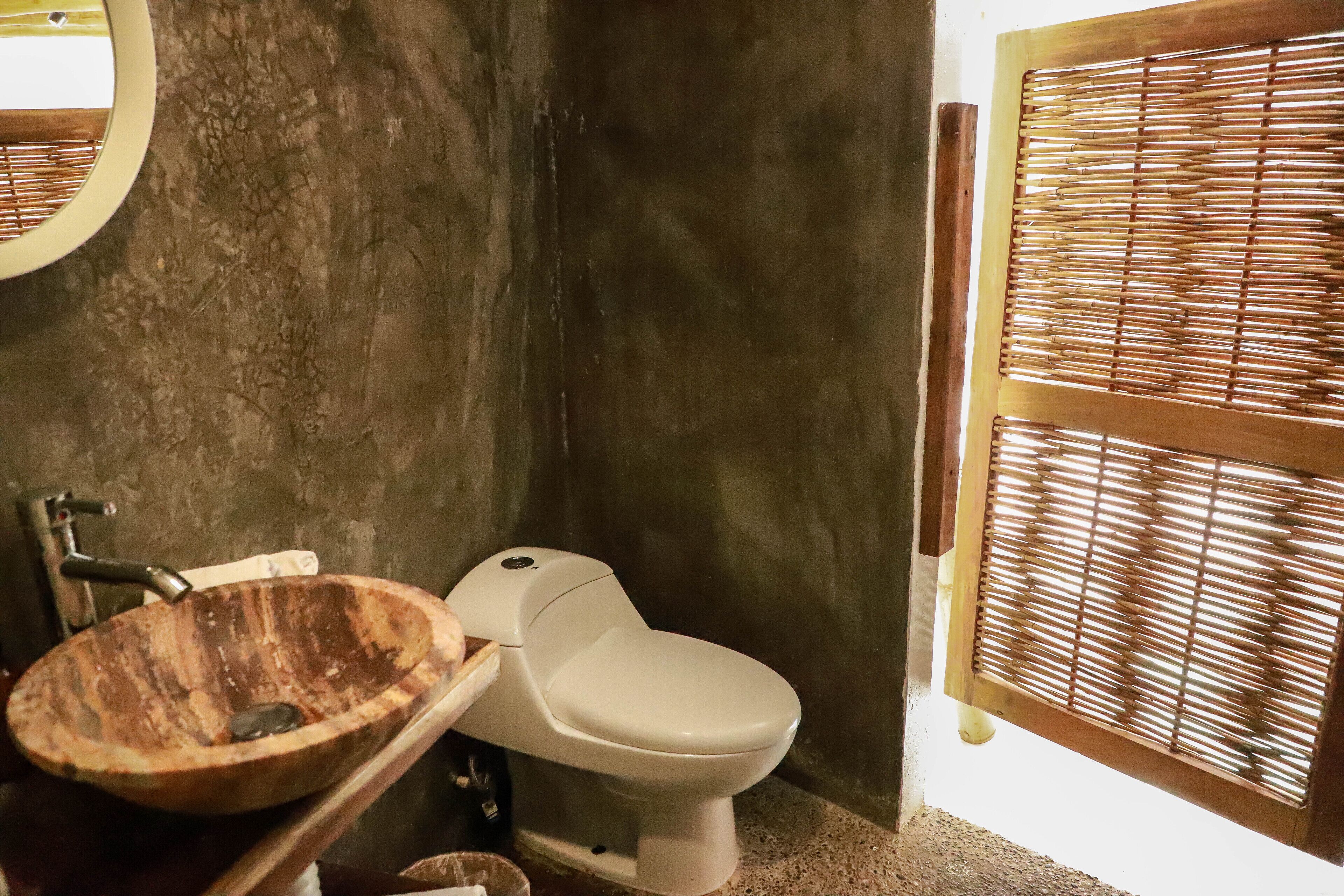 standard room, 1 king bed, partial sea view | bathroom | shower, free toiletries, towels, soap