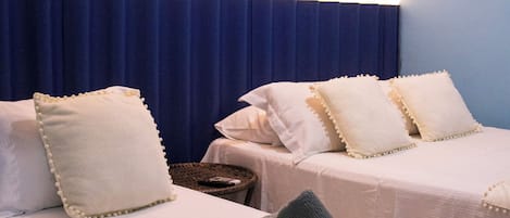 Standard Triple Room | Minibar, blackout drapes, bed sheets