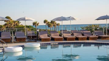 4 piscinas al aire libre, sillones reclinables de piscina
