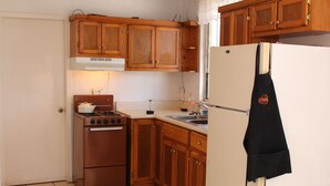 Apartment, 2 Bedrooms | Private kitchen | Full-size fridge, oven, cookware/dishes/utensils - Departamento Del Real (Ensenada)