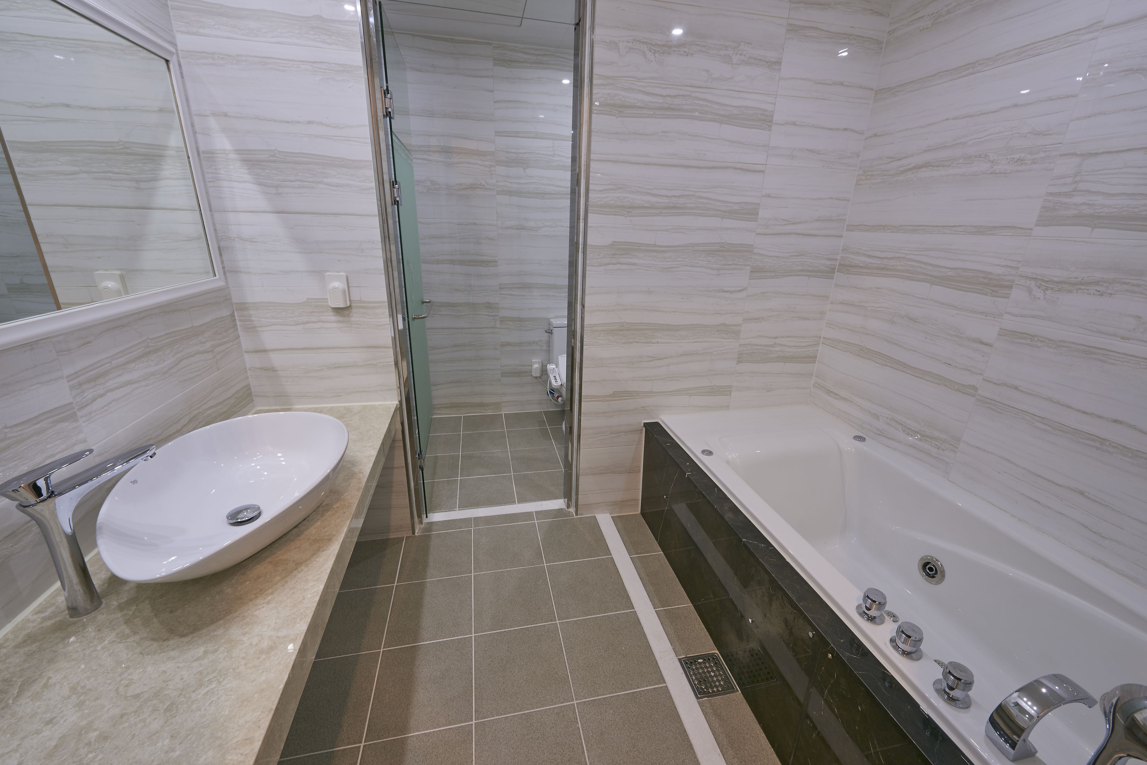 standard double room | bathroom | separate bathtub and shower, jetted bath, hair dryer, bathrobes