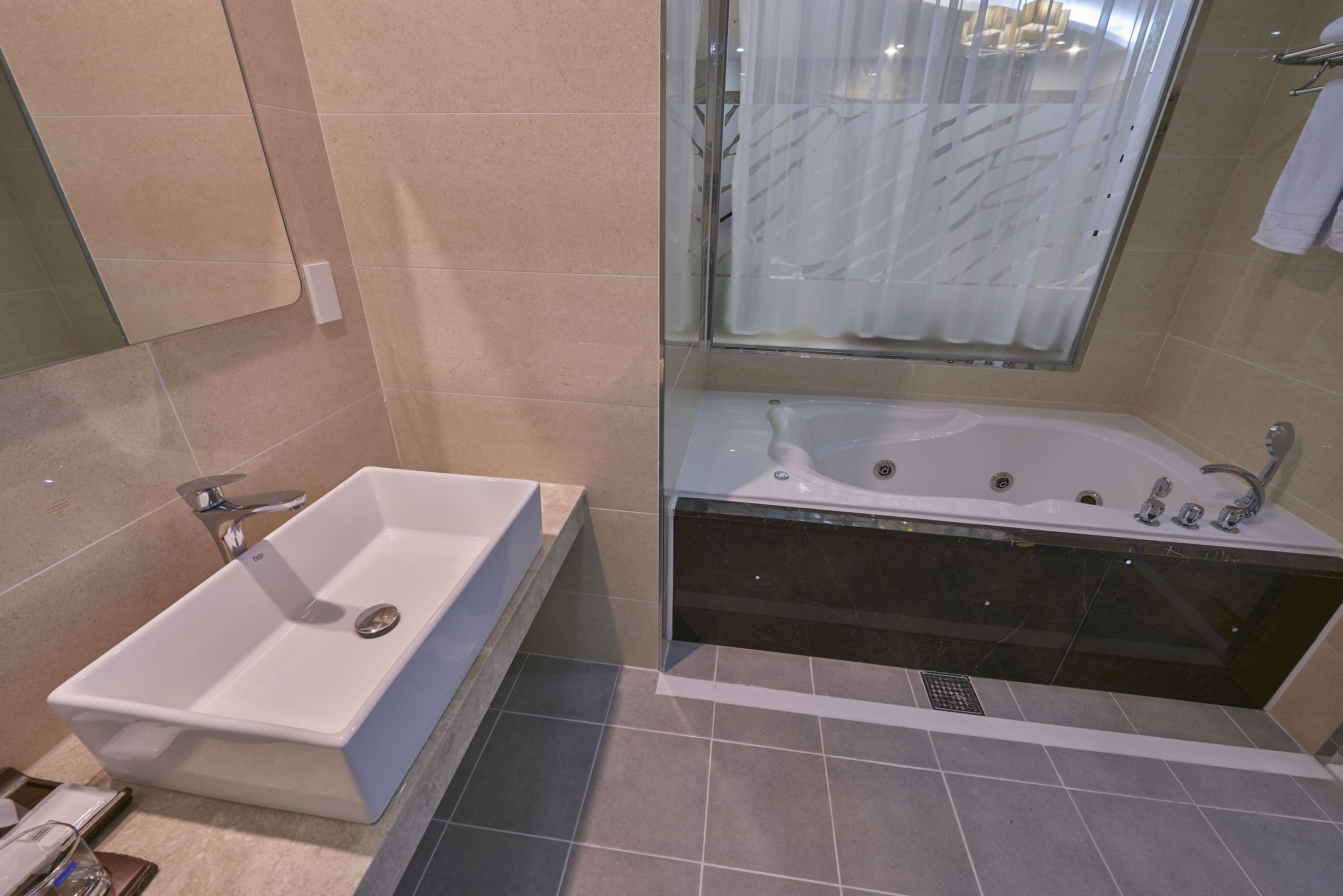 junior suite(lg styler, massage chair) | bathroom | separate bathtub and shower, jetted bath, hair dryer, bathrobes