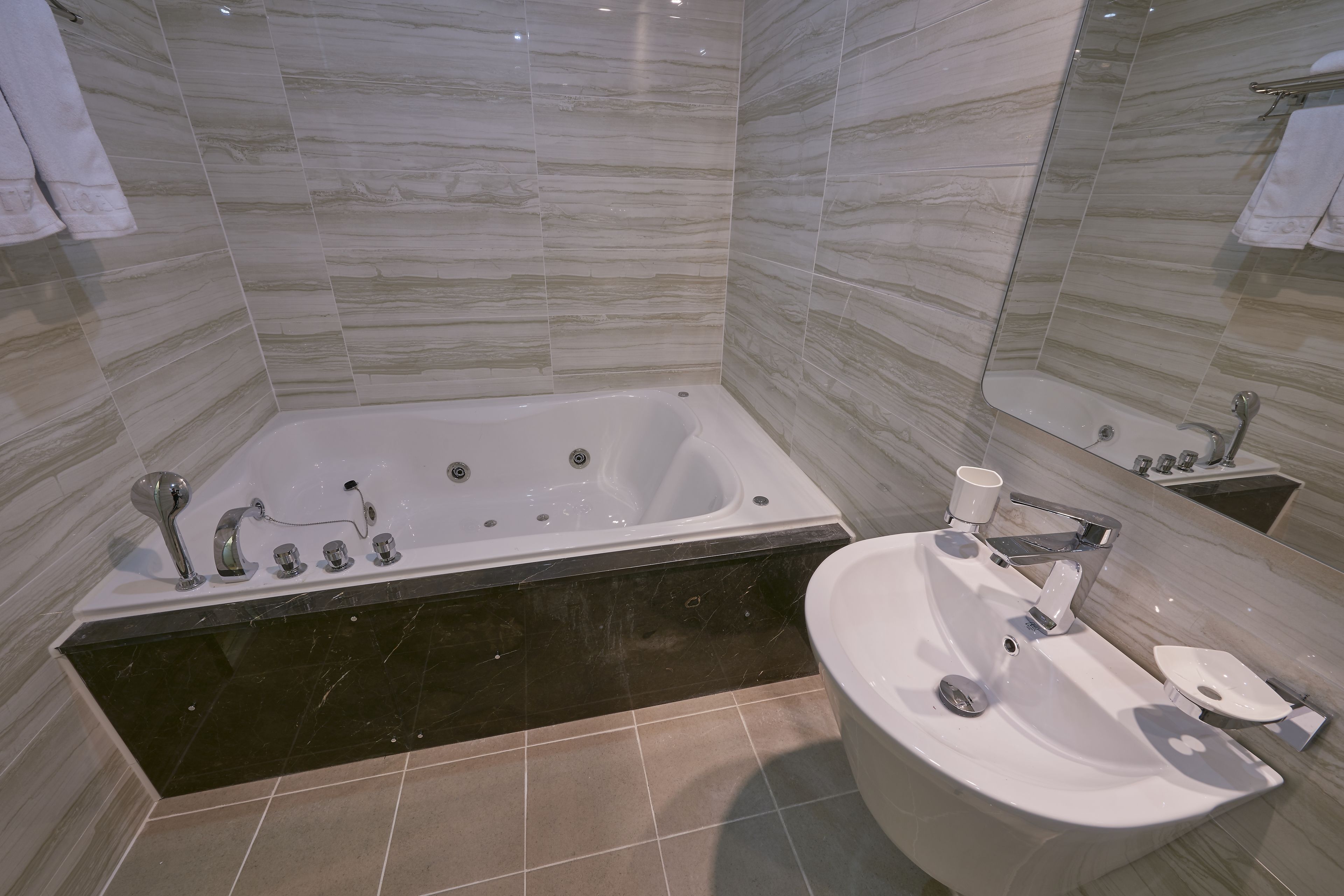 deluxe twin room(lg styler) | bathroom | separate bathtub and shower, jetted bath, hair dryer, bathrobes