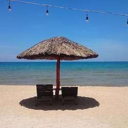 Beach nearby, beach umbrellas, beach towels