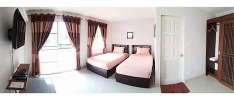 Cortinas blackout, wifi gratis y ropa de cama