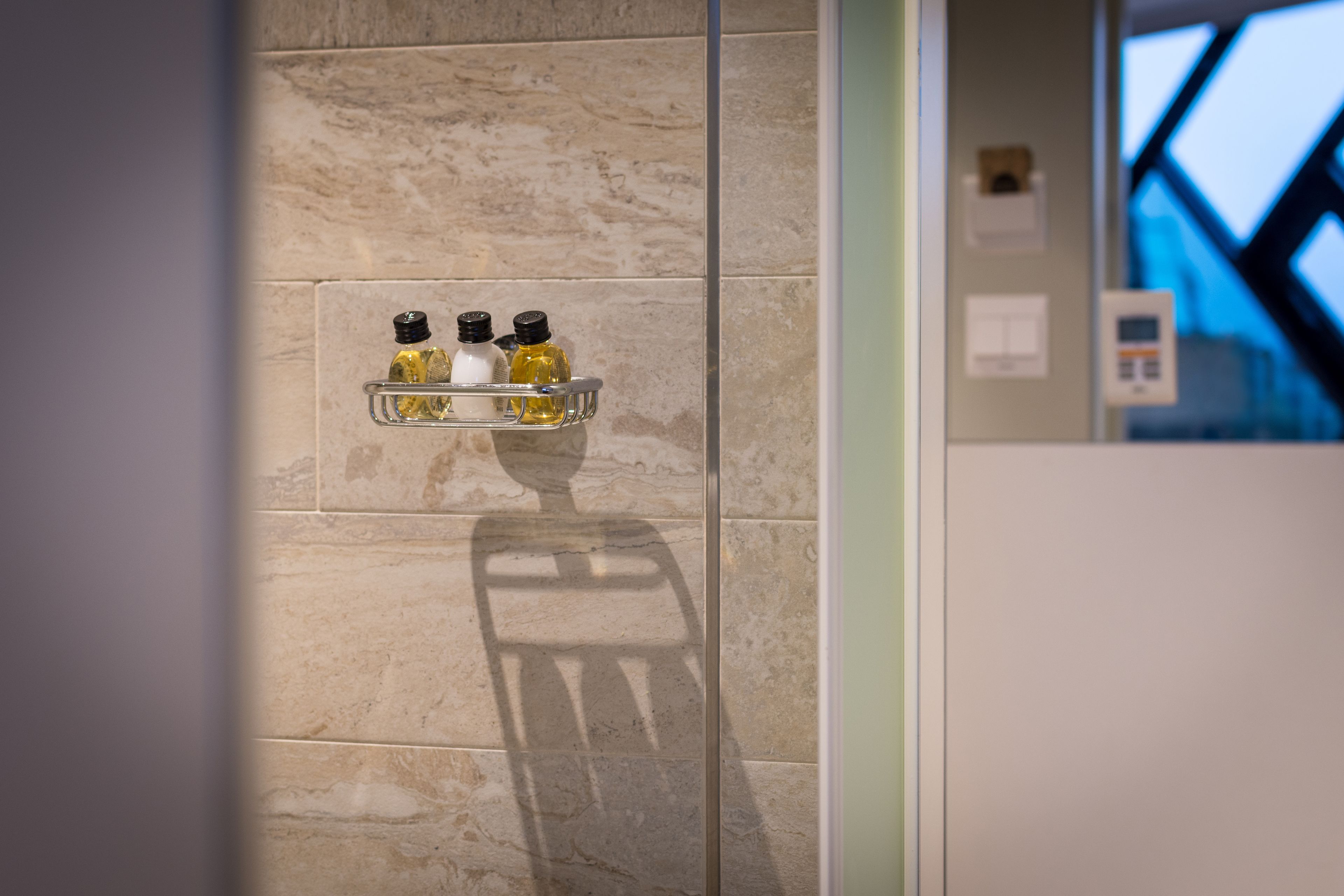 standard single room, non smoking | bathroom | shower, hydromassage showerhead, hair dryer, slippers