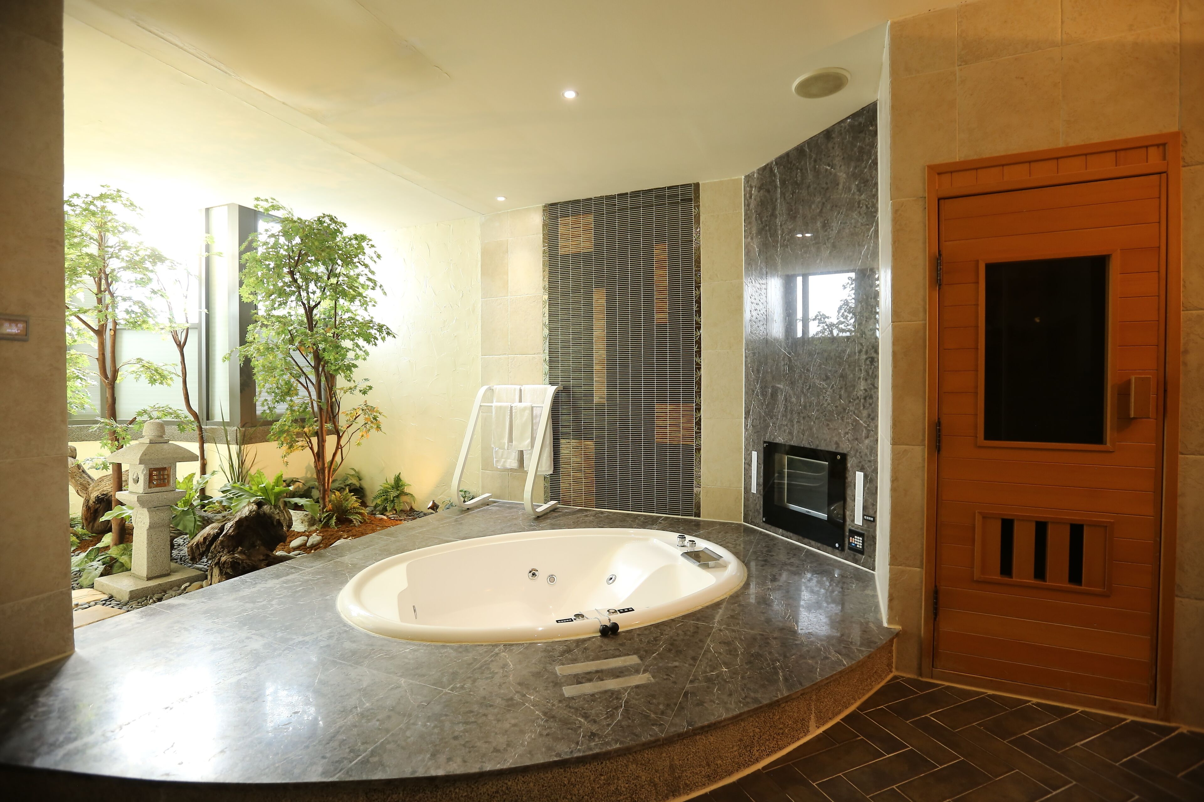 luxury suite | bathroom | separate bathtub and shower, rainfall showerhead, free toiletries
