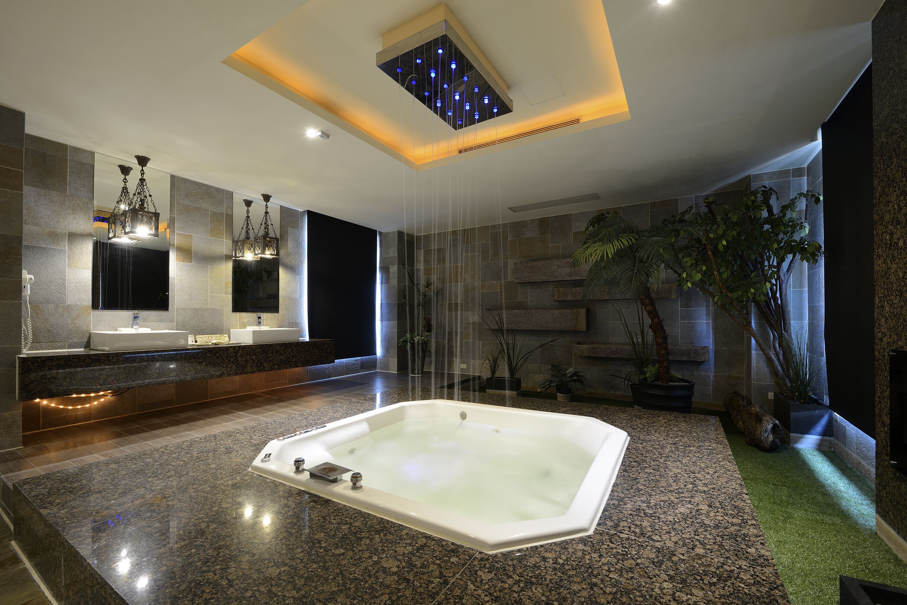 flagship suite | bathroom | separate bathtub and shower, rainfall showerhead, free toiletries