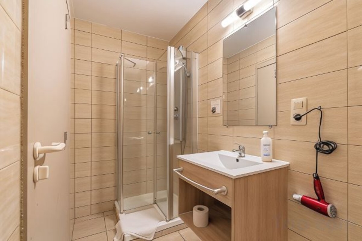 Bathroom | Shower, hair dryer, towels