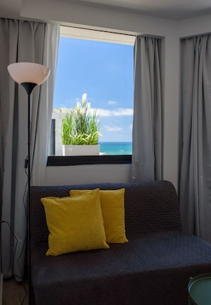 Apartamento superluxo | Área de estar | TV de tela plana