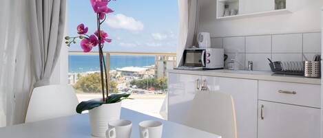 Luxury Apartment | Living area | Flat-screen TV