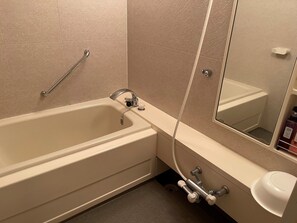 Shower, free toiletries, hair dryer, slippers