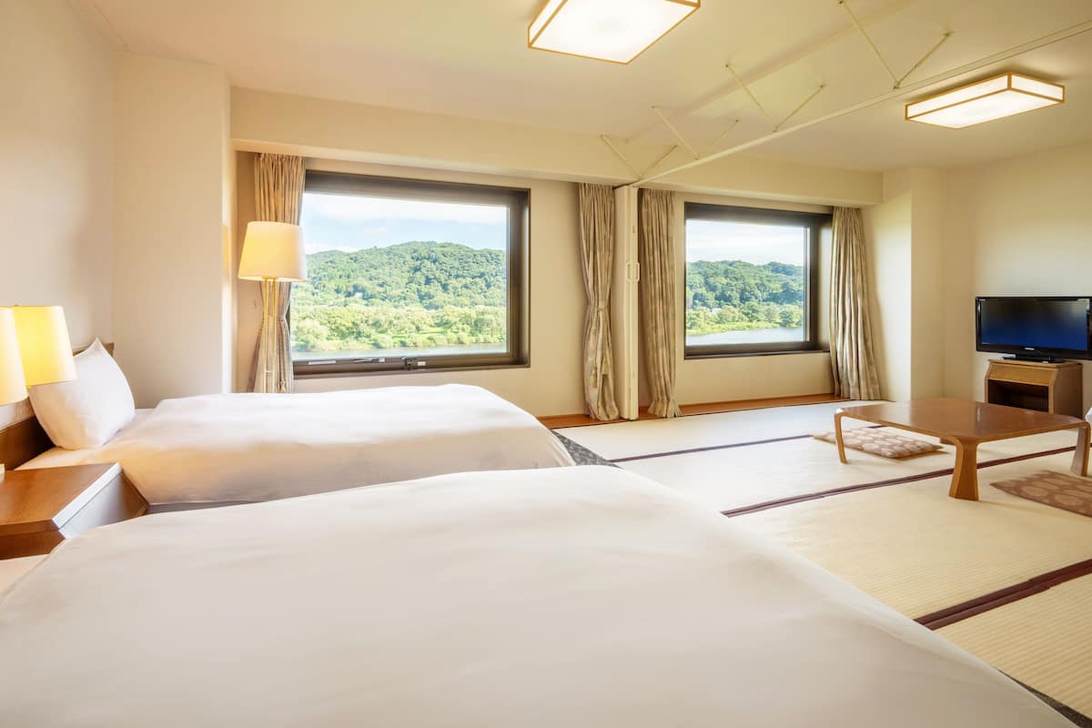Suite, 2 Einzelbetten (4 Futon Japense & Western Style) | 1 Schlafzimmer, Verdunkelungsvorhänge, kostenloses WLAN, Bettwäsche