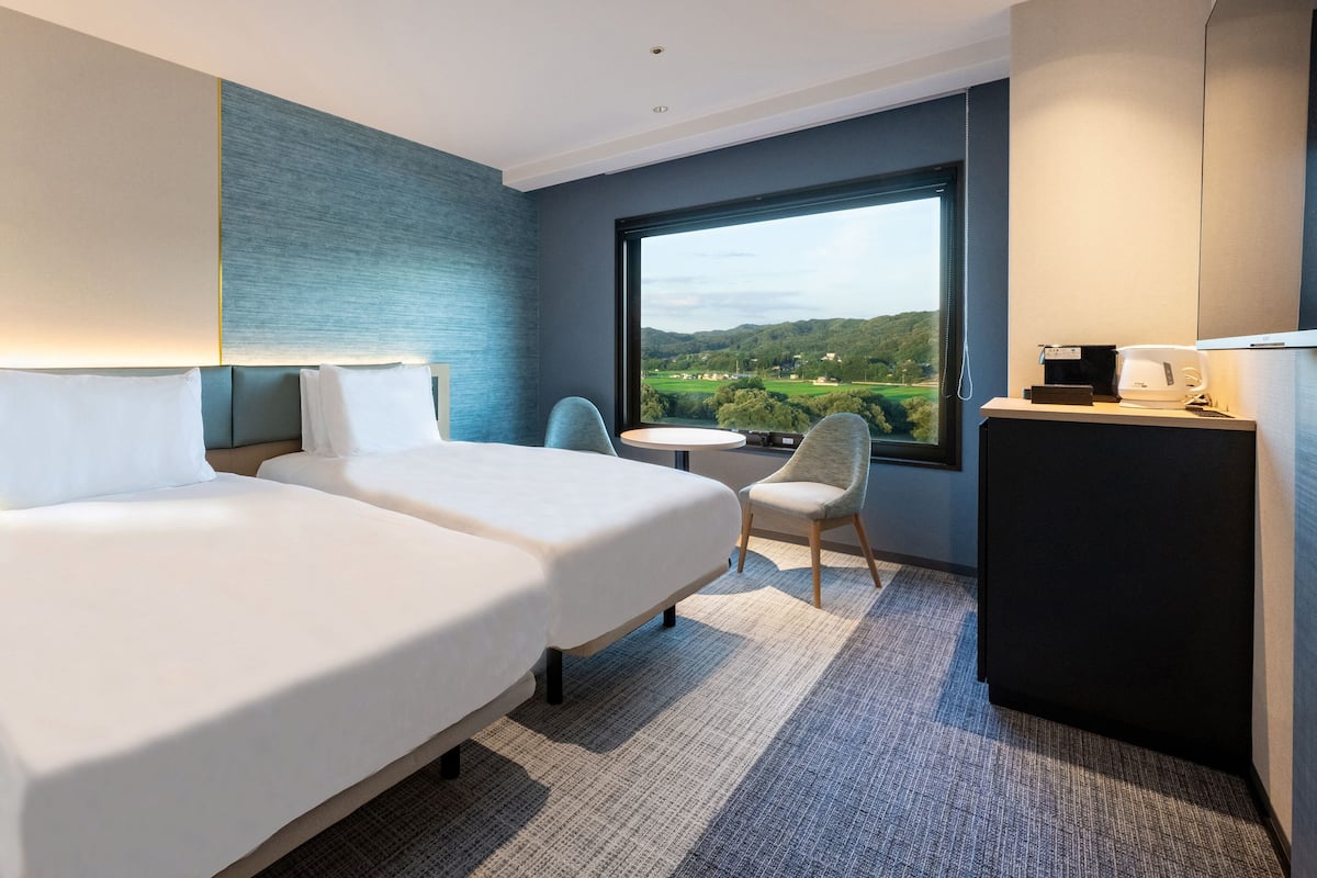 Quarto standard, 2 camas de solteiro | 1 quarto, cortinas blackout, Wi-Fi de cortesia, roupa de cama