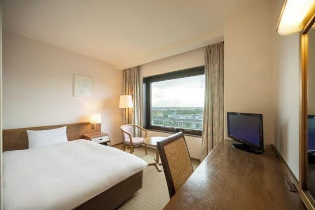 1 habitación, cortinas blackout, wifi gratis y ropa de cama
