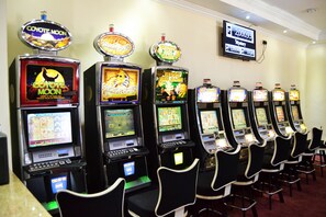 A row of slot machines in a casino. - Thakadu Hotel, Casino & Conference Centre (Letlhakane)