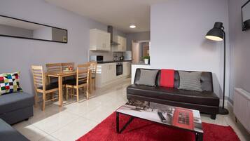 Superior Apartment, 2 Bedrooms | Living room | Flat-screen TV, DVD player