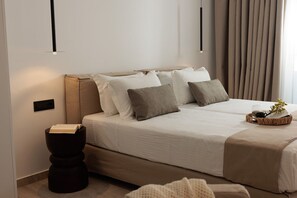 Habitación superior | Ropa de cama de alta calidad y colchones con acolchado adicional