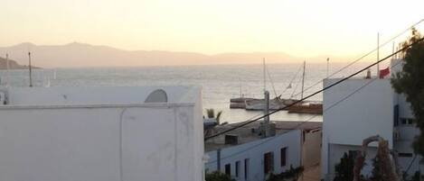 A coastal view with buildings and a clear sky.
