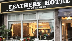 The Feathers Hotel with a sign stating "Rooms All En Suite" and a phone number. - The Feathers Hotel (Blackpool)