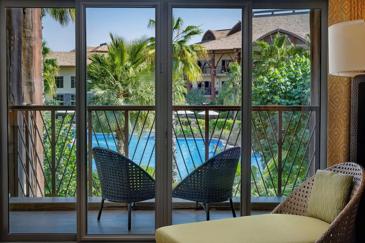 3 outdoor pools, open 8:00 AM to 7:00 PM, pool umbrellas, pool loungers