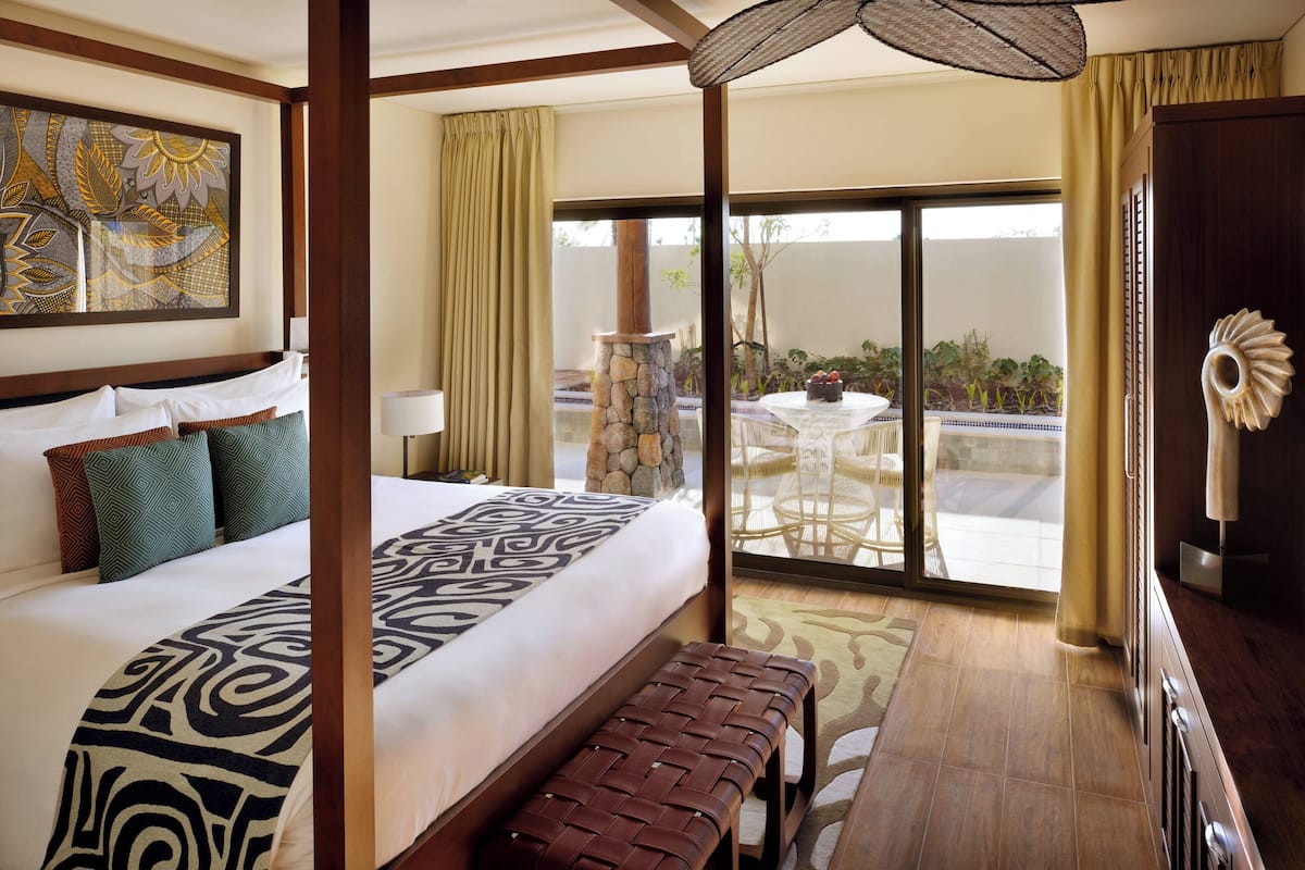 Hypo-allergenic bedding, pillow-top beds, in-room safe