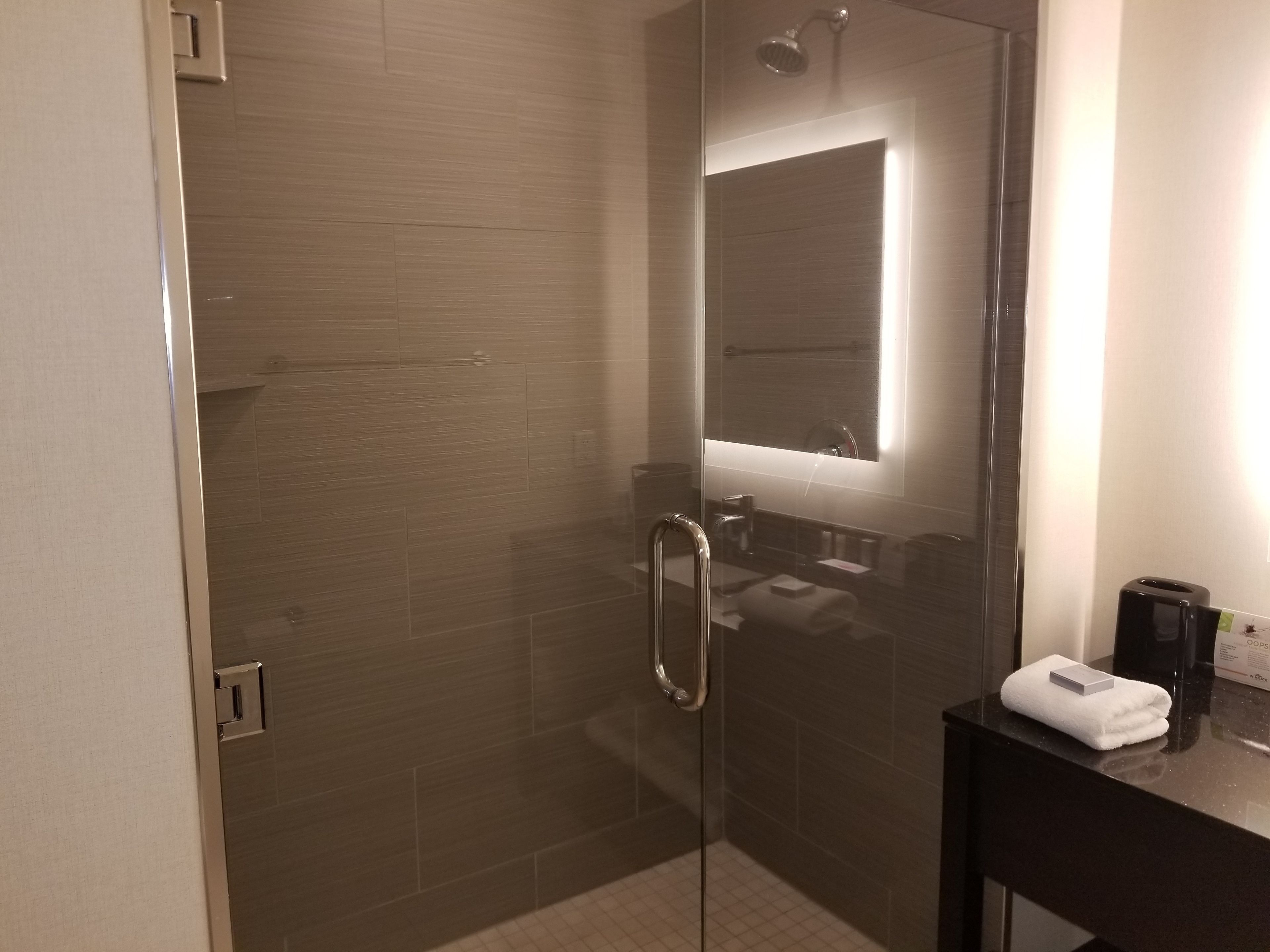 eco-friendly toiletries, hair dryer, towels