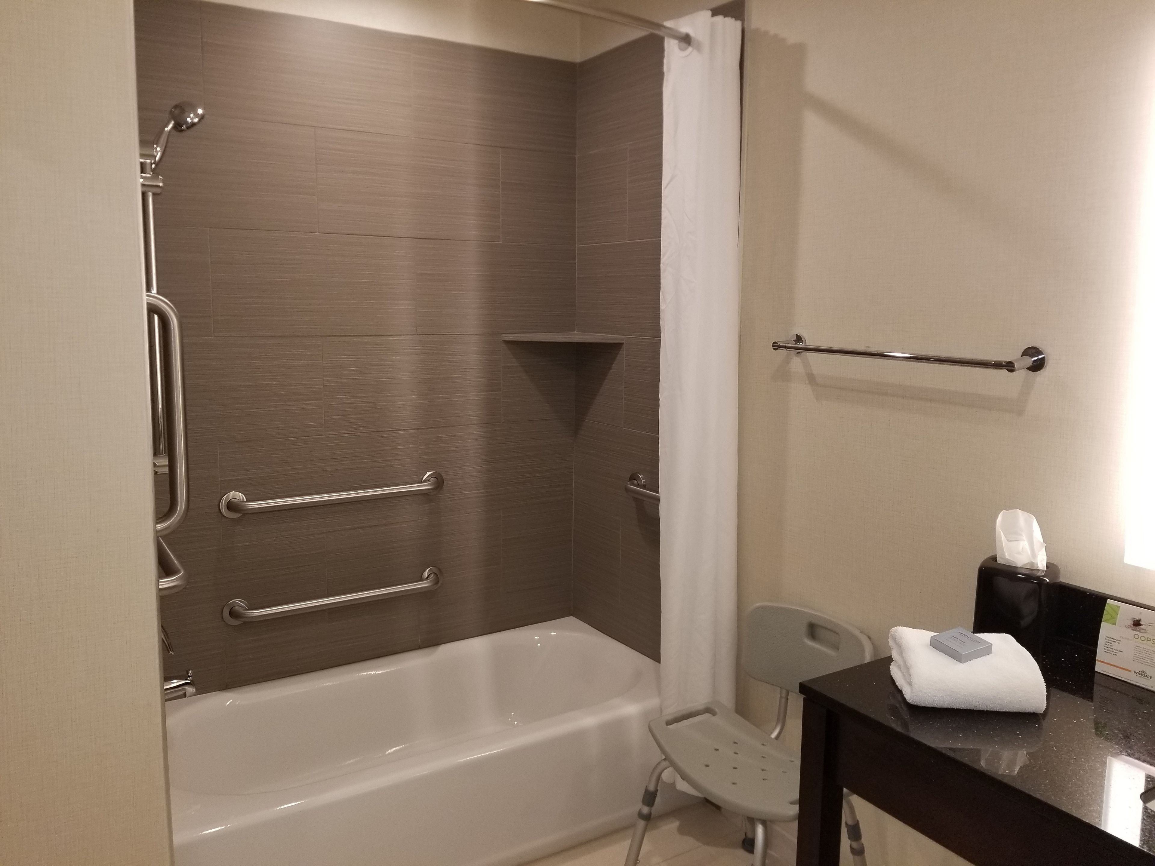 eco-friendly toiletries, hair dryer, towels