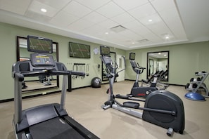 A gym with treadmills, elliptical machines, and exercise balls. - Staybridge Suites Houston - Medical Center by IHG (Houston)