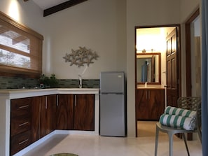 One Bedroom Apartment w/Balcony | Private kitchen | Fridge