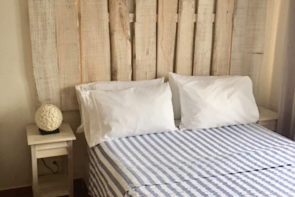 Budget Double Room | In-room safe, individually decorated, blackout curtains