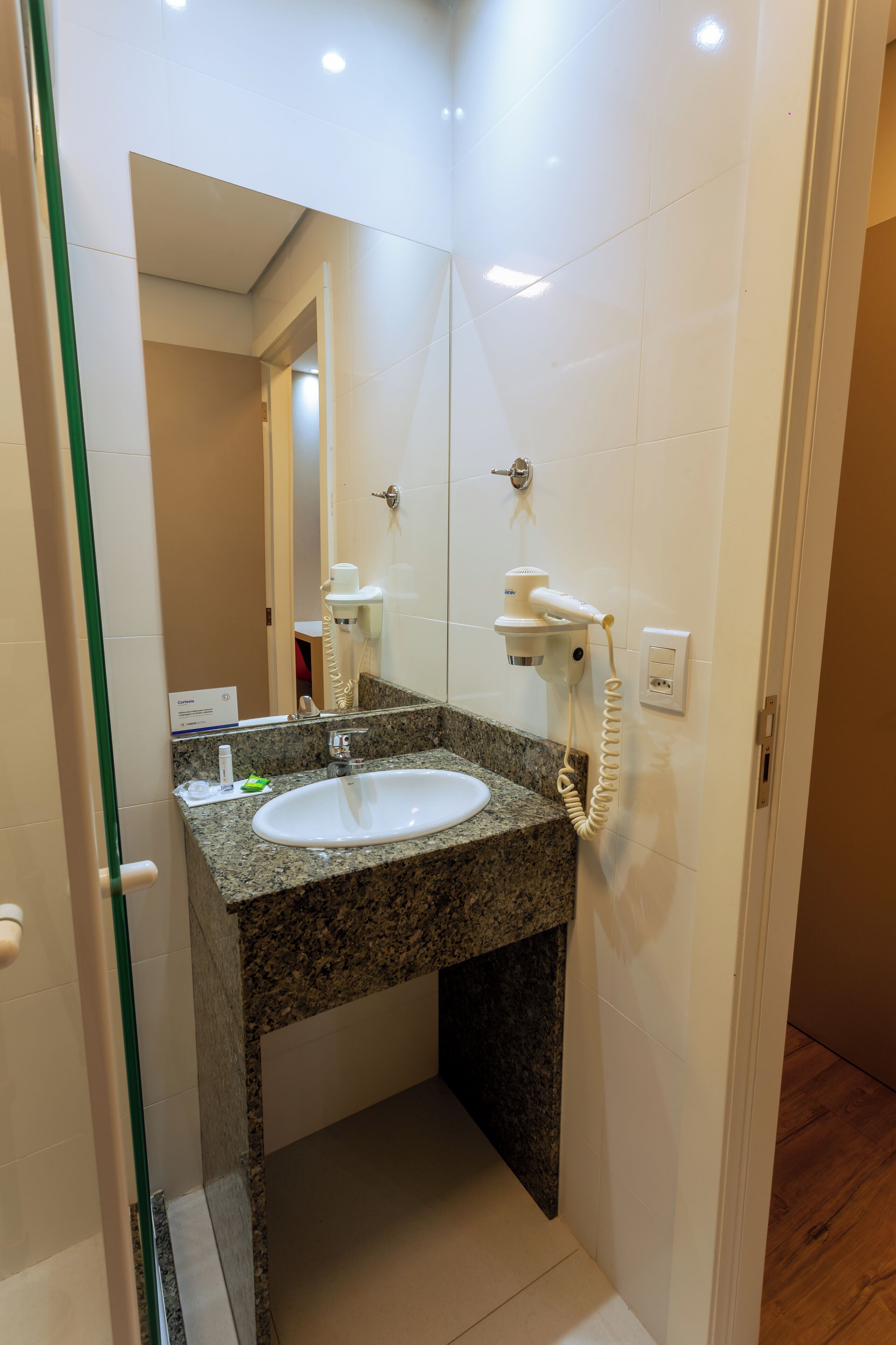 superior triple room | bathroom | shower, rainfall showerhead, free toiletries, hair dryer