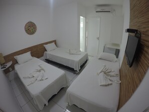 Standard Triple Room | Minibar, individually decorated, iron/ironing board, rollaway beds