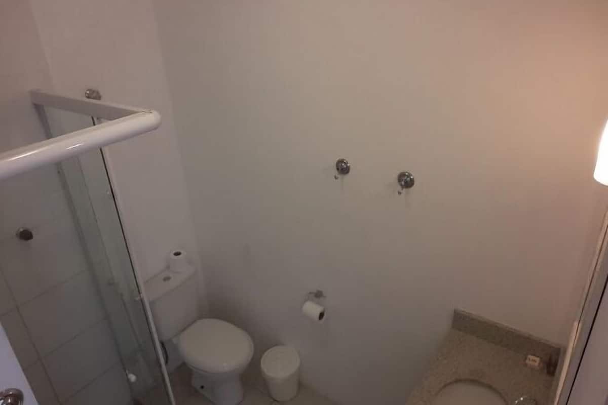 Shower, designer toiletries, towels