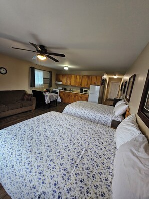 Family Room, Multiple Beds, Kitchen | 1 bedroom, laptop workspace, blackout drapes, free WiFi - Fair Isle Motel (Whycocomagh)