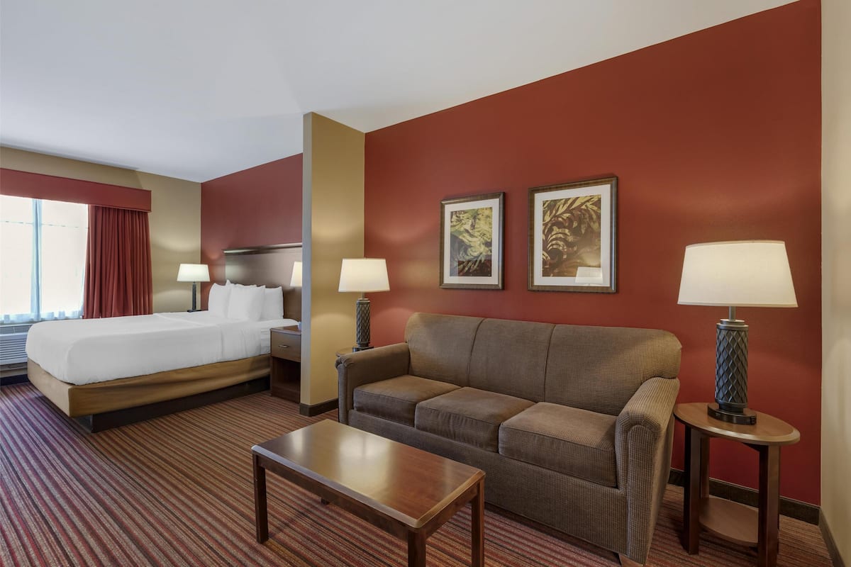 Chambre Standard, 1 trÚs grand lit, accessible aux personnes à mobilité réduite, non-fumeurs | Surmatelas, bureau, fer et planche à repasser, Wi-Fi gratuit