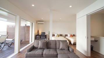 Habitación familiar, 4 habitaciones, junto a la playa | Vistas desde la habitación