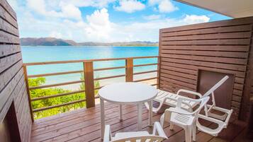 Twin Room, 2 Twin Beds, Ocean View, Beachside | 2 bedrooms, in-room safe, iron/ironing board, free WiFi