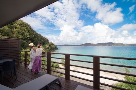 Habitación familiar, 4 habitaciones, junto a la playa | 2 dormitorios, caja fuerte, tabla de planchar con plancha y wifi gratis. Native Sea Amami Adan On The Beach