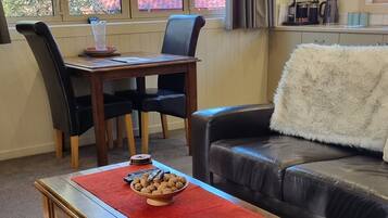 Moonlight Cottage | Living area | LCD TV, fireplace, DVD player, iPod dock