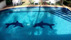 A swimming pool with two dolphin tiles. - Hua Hin Home 66 Pool Villa (Hua Hin)