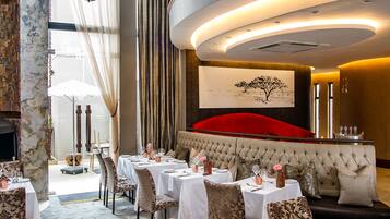 Breakfast, lunch, dinner served; local and international cuisine