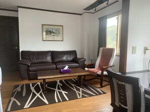 Apartment, Mountain View (  1  ) | Living area | Flat-screen TV, DVD player - Hakuba Ski Condos (Hakuba)