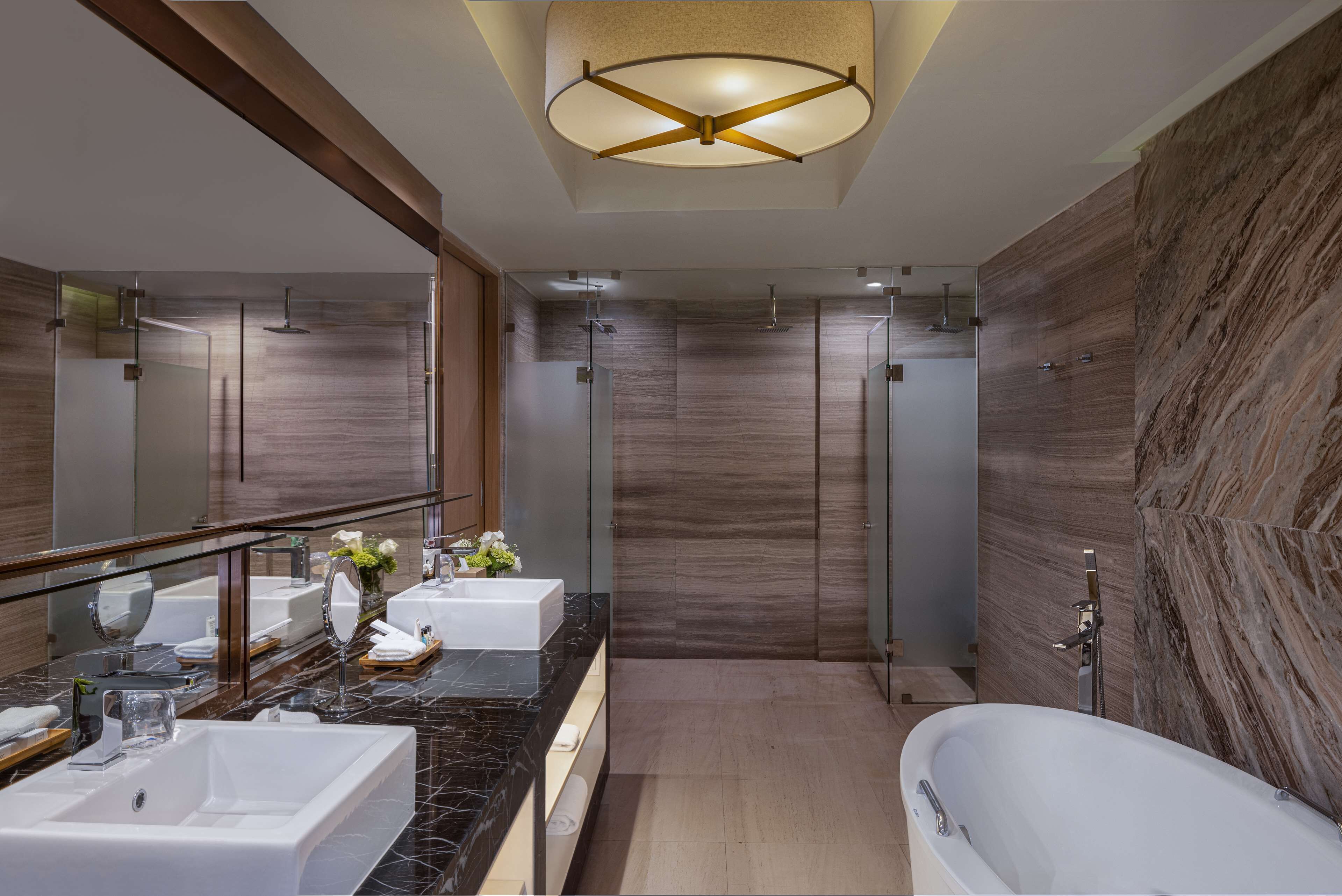 presidential suite with  15% discount on food and soft beverages | bathroom | shower, rainfall showerhead, eco-friendly toiletries, hair dryer