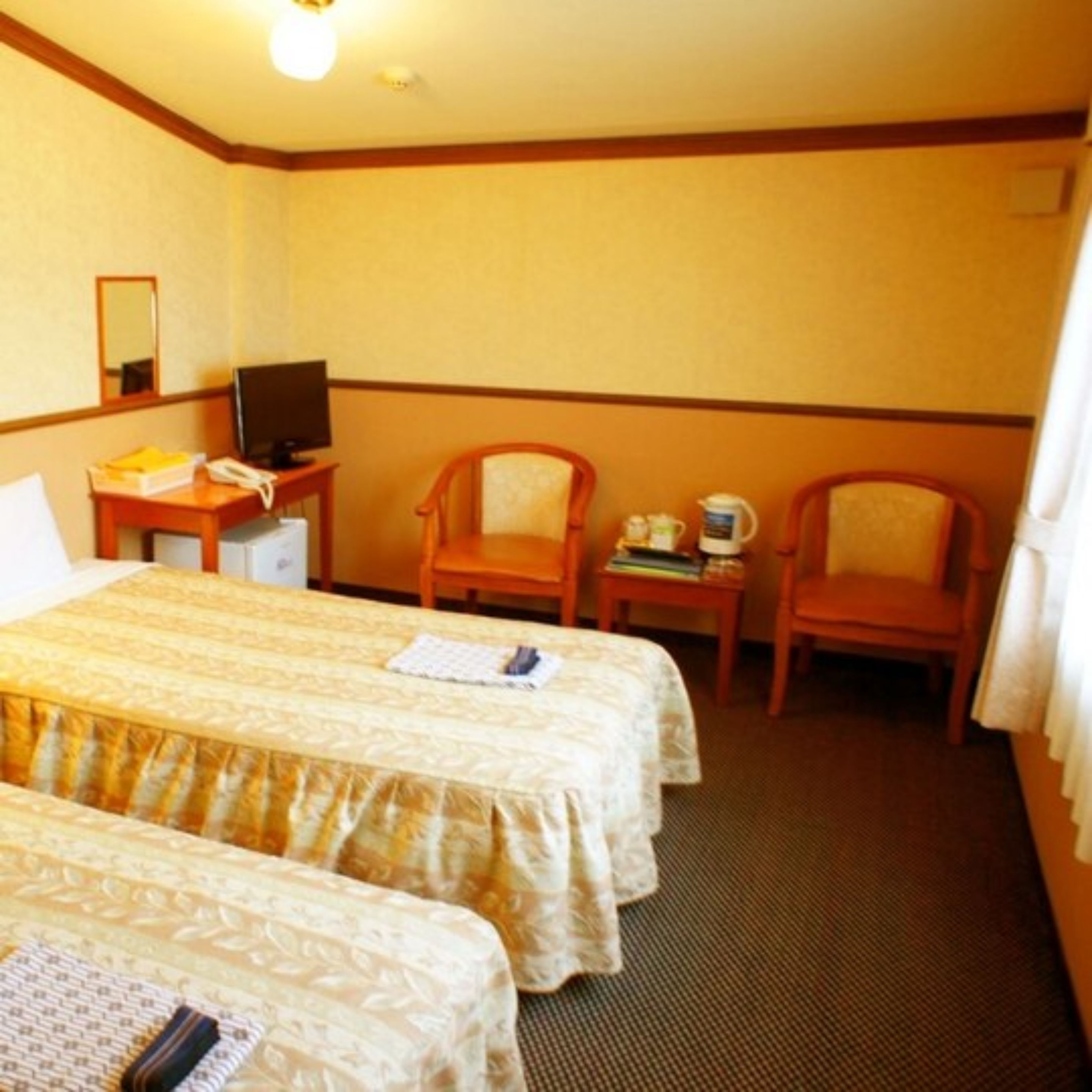 laptop workspace, blackout curtains, free wifi, bed sheets